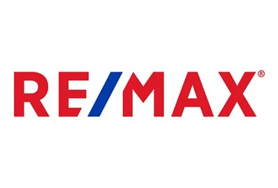 RE/MAX logo with red and blue lettering on a white background.